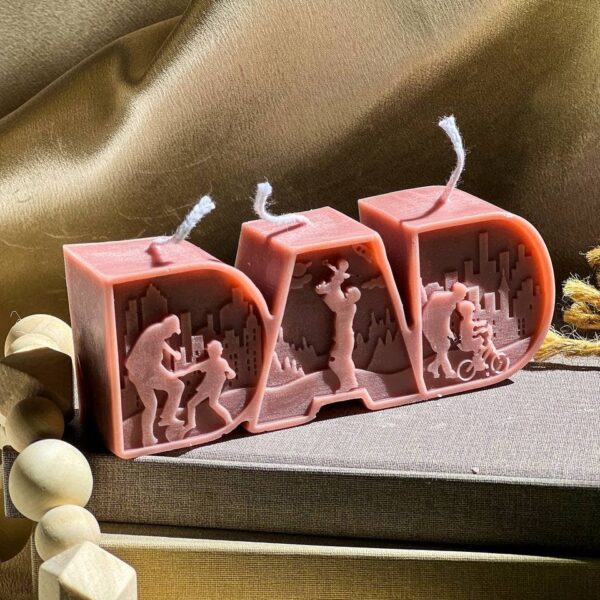 DAD Letter Candle 1.5x4.5in Cream, Sea Salt & Orchid - Image 4