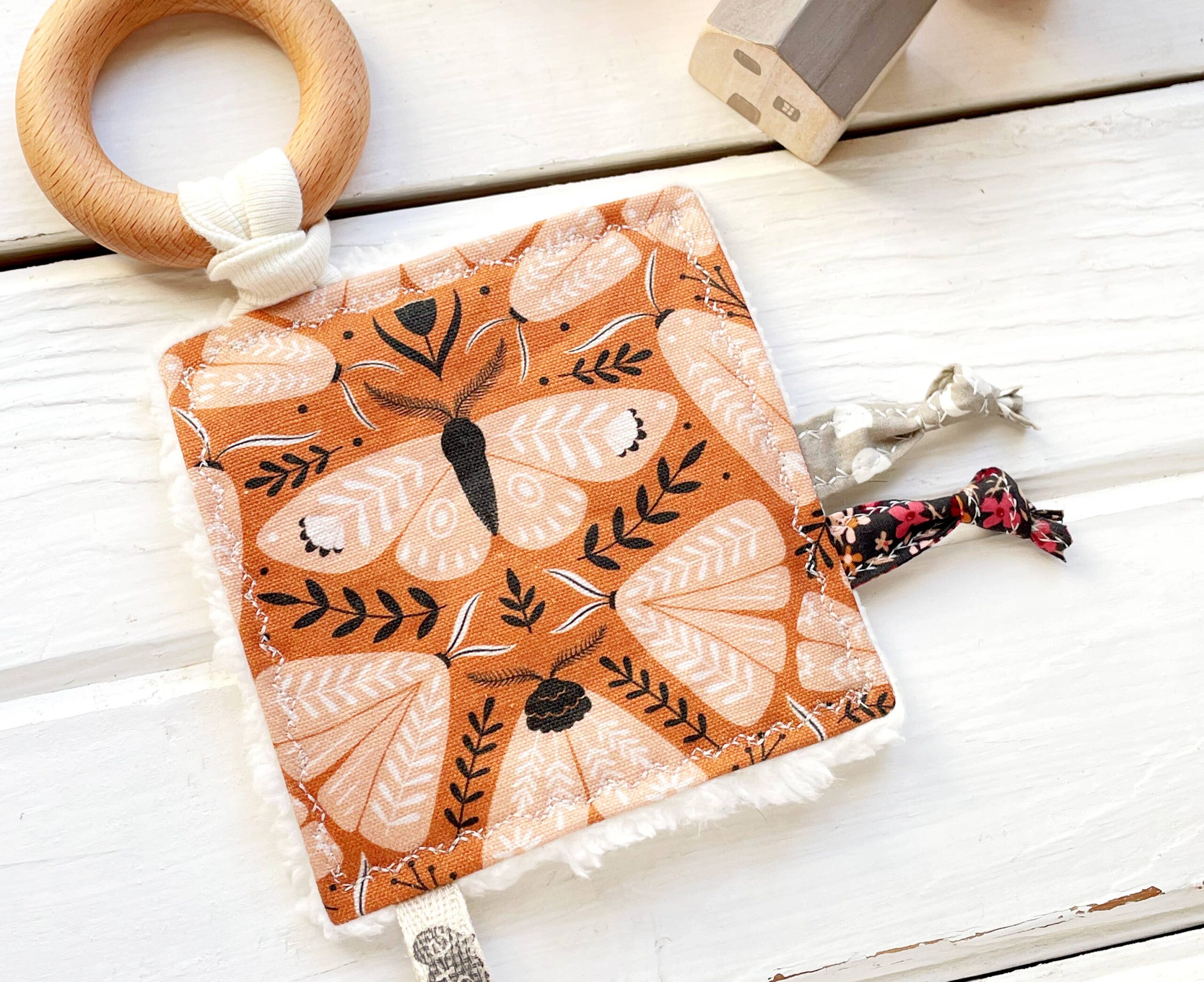 The Bird & Elephant - Folk Moth Canvas Crinkle Tag Toy Terra Cotta and Black