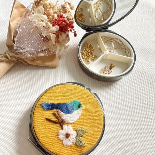 Quince Fables - Floral Embroidered Round Jewelry Box With Mirror
Success - Image 6